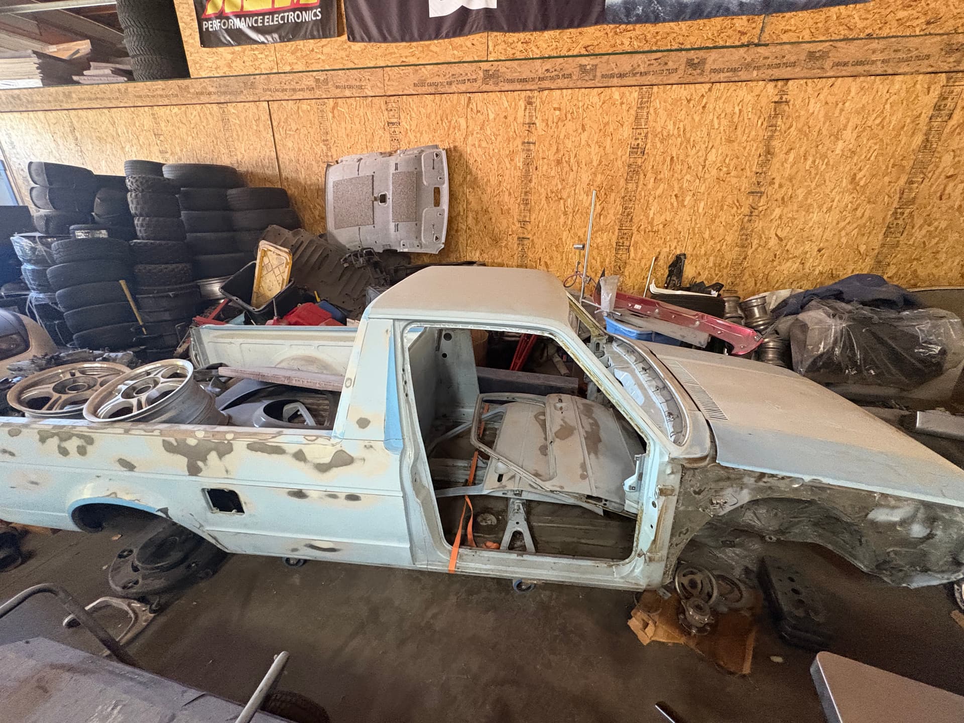 Rust free 1981 shell ready for paint, excluding engine and transmission.